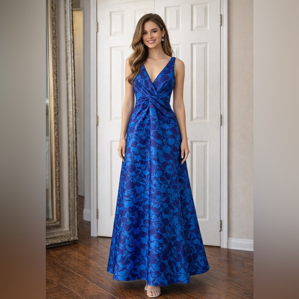 Elegant Monique Lhuillier evening gown in a rich blue floral jacquard. NWT